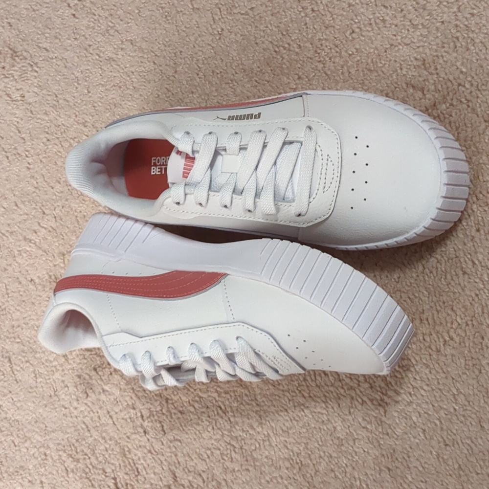 Puma sneakers size 8M new when purchased. 
Only worn twice, but still look new.